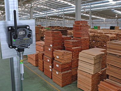 Lumber warehouse with a wireless sensor that is monitoring temperature and humidity.
